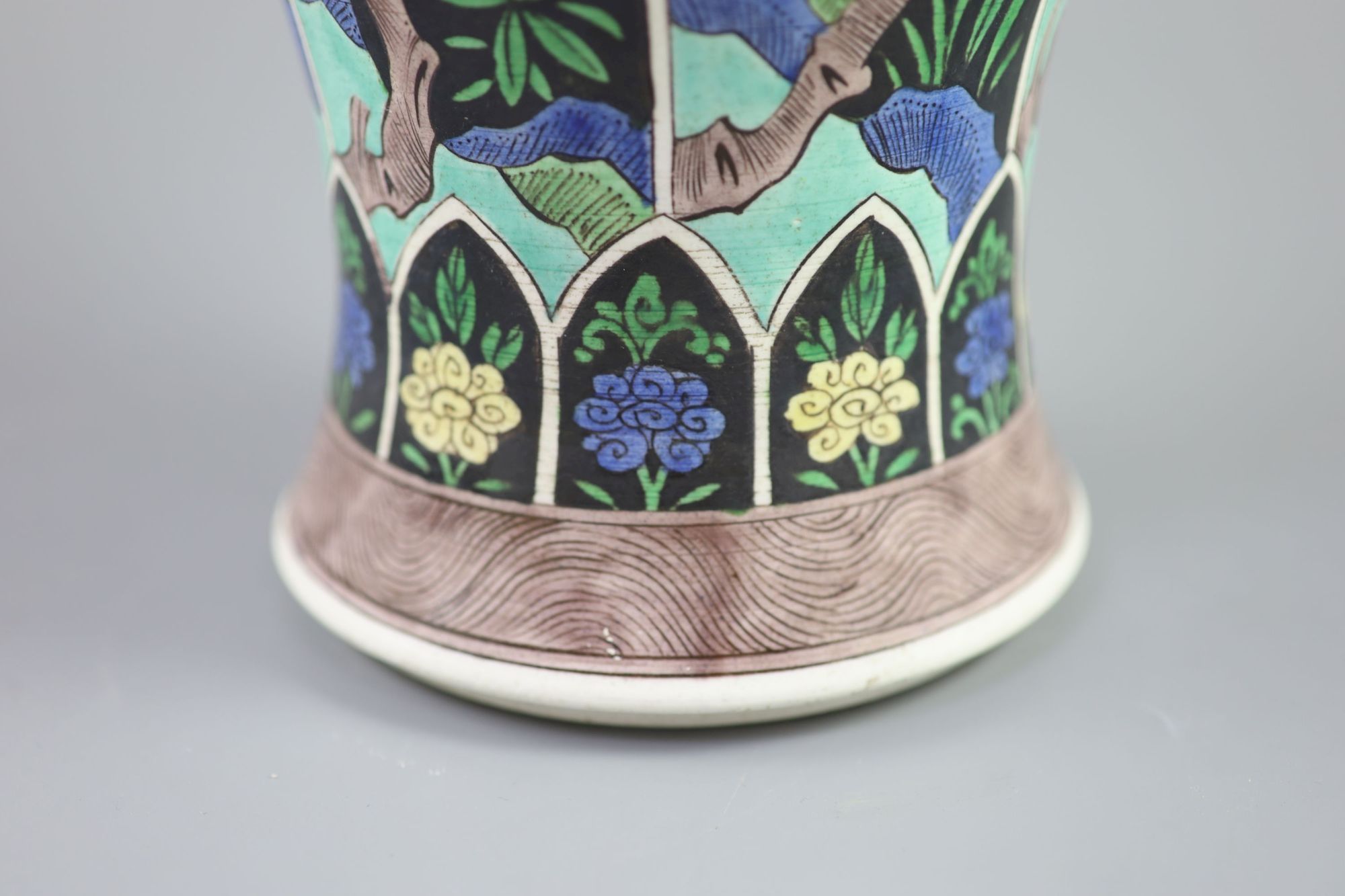 A Chinese famille noire enamelled biscuit baluster vase and cover, 19th century, 47cm high